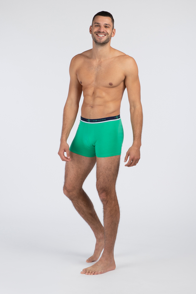 Photo of male model smiling wearing underpants